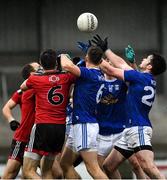 15 November 2020; Cavan players, left to right, Gearóid McKiernan, Ciarán Brady, Stephen Smith and Thomas Galligan battle for the ball against Down players, left to right, Kevin McKernan, and Caolán Mooney during the Ulster GAA Football Senior Championship Semi-Final match between Cavan and Down at Athletic Grounds in Armagh. Photo by Dáire Brennan/Sportsfile