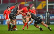 15 November 2020; Jack O'Donoghue of Munster is tackled by Dan Lydiate and Kieran Williams of Ospreys during the Guinness PRO14 match between Munster and Ospreys at Thomond Park in Limerick. Photo by Diarmuid Greene/Sportsfile
