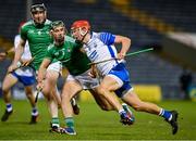 15 November 2020; Jack Prendergast of Waterford in action against Sean Finn of Limerick during the Munster GAA Hurling Senior Championship Final match between Limerick and Waterford at Semple Stadium in Thurles, Tipperary. Photo by Brendan Moran/Sportsfile