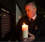 16 November 2020; Uachtarán CLG John Horan lights a candle at the Bloody Sunday memorial in Croke Park. In lieu of a larger commemorative event at Croke Park, the GAA is encouraging members, supporters and the wider public to light a candle at dusk this Saturday 21 November, remembering the 14 lives lost that day 100 years ago. Photo by Brendan Moran/Sportsfile