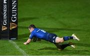 16 November 2020; Luke McGrath of Leinster dives over to score his side's fourth try during the Guinness PRO14 match between Leinster and Edinburgh at RDS Arena in Dublin. Photo by Ramsey Cardy/Sportsfile