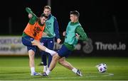 17 November 2020; Troy Parrott has a shot despite the attention of Ciaran Clark, right, during a Republic of Ireland training session at the FAI National Training Centre in Abbotstown, Dublin. Photo by Stephen McCarthy/Sportsfile
