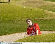 23 January 2004; Clare 'keeper' David Fitzgerald plays from a bunker during a game of golf in advance of the Vodafone Allstars game. ASU Karsden Golf Club, Temple, Arizona, USA. Picture credit; Ray McManus / SPORTSFILE *EDI*