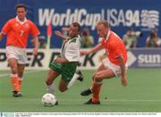 4 July 1994; Terry Phelan, Republic of Ireland, in action against Denis Bergkamp, Holland. FIFA World Cup Finals, Republic of Ireland v Holland, Orange Bowl, Orlando, Florida, USA. Picture credit; David Maher / SPORTSFILE