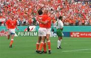 4 July 1994; Dennis Bergkamp of Holland is congratulated by team-mate Marc Overmars on scoring their side's goal as Terry Phelan of Republic of Ireland looks on during the FIFA World Cup Finals, Round of 16 match between Republic of Ireland and Holland at the Orange Bowl, inOrlando, Florida, USA. Photo by David Maher/SPORTSFILE