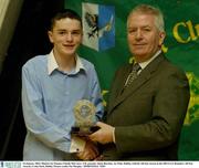 24 January 2004; Minister for Finance Charlie McCreevy T.D. presents Adam Riordan, An Tinle, Dublin, with his All-Star award at the 2003 GAA Rounders All Star Awards, Croke Park, Dublin. Picture credit; Pat Murphy / SPORTSFILE *EDI*