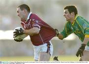 25 January 2004; Michael Ennis, Westmeath, in action against Tomas O'Connor, Meath. O'Byrne Cup Final, Westmeath v Meath, Cusack Park, Mullingar, Co. Westmeath. Picture credit; David Maher / SPORTSFILE *EDI*