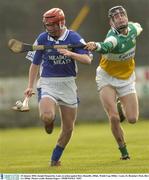 25 January 2004; Joseph Fitzpatrick, Laois, in action against Rory Hanniffy, Offaly. Walsh Cup, Offaly v Laois, St. Brendan's Park, Birr, Co. Offaly. Picture credit; Damien Eagers / SPORTSFILE *EDI*