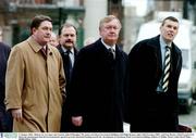 27 January 2004;  Minister for Art, Sport and Tourism, John O'Donoghue TD, centre, arriving at Government Buildings with Philip Browne, right, Chief Executive, IRFU, and Fran Rooney, Chief Executive FAI before the announcment that the Government has agreed to provide substantial funding towards the  development of Lansdowne Road. Government buildings, Kildare St. Dublin. Picture credit; David Maher  / SPORTSFILE *EDI*