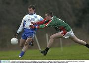 28 January 2004; Damien Burke, DIT, in action against Kevin Hinphey, UUC, Sigerson Cup football, Preliminary Round, Dublin Institute of Technology v University Ulster Coleraine, Long Meadows, Islandbridge, Dublin. Picture credit; Brian Lawless / SPORTSFILE *EDI*
