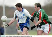 28 January 2004; Liam Mooney, DIT, in action against Nigel Shevlin, UUC, Sigerson Cup football, Preliminary Round, Dublin Institute of Technology v University Ulster Coleraine, Long Meadows, Islandbridge, Dublin. Picture credit; Brian Lawless / SPORTSFILE *EDI*