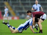6 July 2013; Tommy Prendergast, Waterford, in action against Michael Meehan, Galway. GAA Football All-Ireland Senior Championship, Round 2, Galway v Waterford, Pearse Stadium, Salthill, Galway. Picture credit: Ray Ryan / SPORTSFILE