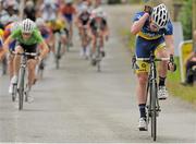 6 July 2013; Owen Gillott, Nicolas Roche Performance Team - Standard Life, celebrates as he takes victory on Stage 5 on the 2013 Junior Tour of Ireland, Ennis - Cooraclare, Co. Clare. Picture credit: Stephen McMahon / SPORTSFILE