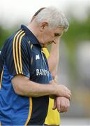 6 July 2013; Clare manager Mick O'Dwyer looks at his watch late on in the second half. GAA Football All-Ireland Senior Championship, Round 2, Clare v Laois, Cusack Park, Ennis, Co. Clare. Picture credit: Diarmuid Greene / SPORTSFILE