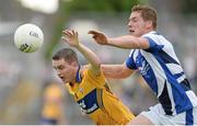 6 July 2013; Martin McMahon, Clare, in action against Darren Strong, Laois. GAA Football All-Ireland Senior Championship, Round 2, Clare v Laois, Cusack Park, Ennis, Co. Clare. Picture credit: Diarmuid Greene / SPORTSFILE