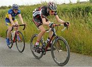 6 July 2013; Stephen Shanahan, Munster Sensa, leads breakaway companion Danny Bruton, Nicolas Roche Performance Team - Standard Life, during Stage 5 on the 2013 Junior Tour of Ireland, Ennis - Cooraclare, Co. Clare. Picture credit: Stephen McMahon / SPORTSFILE