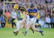6 July 2013; Colin Fennelly, Kilkenny, in action against Conor O'Brien, Tipperary. GAA Hurling All-Ireland Senior Championship, Phase II, Kilkenny v Tipperary, Nowlan Park, Kilkenny. Picture credit: Brendan Moran / SPORTSFILE