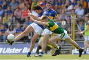 7 July 2013; Colin O'Riordan, Tipperary, in action against Eanna O Conchuir, Kerry. Electric Ireland Munster GAA Football Minor Championship Final, Kerry v Tipperary, Fitzgerald Stadium, Killarney, Co. Kerry. Picture credit: Diarmuid Greene / SPORTSFILE