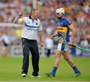 6 July 2013; Tipperary manager Eamon O'Shea speaks to Patrick Maher during the game. GAA Hurling All-Ireland Senior Championship, Phase II, Kilkenny v Tipperary, Nowlan Park, Kilkenny. Picture credit: Brendan Moran / SPORTSFILE