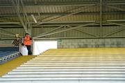 6 July 2013; A Kilkenny supporter and a Nowlan Park steward wait for the crowd to arrive in the main stand before the game. GAA Hurling All-Ireland Senior Championship, Phase II, Kilkenny v Tipperary, Nowlan Park, Kilkenny. Picture credit: Brendan Moran / SPORTSFILE