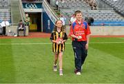 7 July 2013; Holly McGuinness and Keith Leonard are pictured at the Electric Ireland Leinster GAA Minor Hurling Championship Final, where they were the official ball-carriers and had the honour of presenting the match sliotar to the referee John Keenan before the game. Holly and Keith won their prizes through Electric Ireland’s Facebook page www.facebook.com/ElectricIreland. Electric Ireland Leinster GAA Hurling Minor Championship Final, Laois v Kilkenny, Croke Park, Dublin. Picture credit: David Maher / SPORTSFILE
