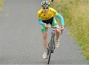 7 July 2013; Overall race leader Eddie Dunbar, Ireland - Stena Line, approaches the finish line on Gallows Hill to take victory on Stage 6 on the 2013 Junior Tour of Ireland, Ennis - Gallows Hill, Co. Clare. Picture credit: Stephen McMahon / SPORTSFILE