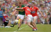 7 July 2013; Johnny Buckley, Kerry, in action against Donncha O'Connor, left, and Daniel Goulding, Cork. Munster GAA Football Senior Championship Final, Kerry v Cork, Fitzgerald Stadium, Killarney, Co. Kerry. Picture credit: Diarmuid Greene / SPORTSFILE