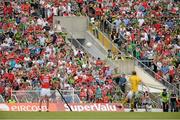 7 July 2013; Spectators look on as Kerry goalkeeper Brendan Kealy scores his's side's last point before half time, leaving the half-time score at Kerry 1 goal 10 points to Cork 6 points. Munster GAA Football Senior Championship Final, Kerry v Cork, Fitzgerald Stadium, Killarney, Co. Kerry. Picture credit: Diarmuid Greene / SPORTSFILE