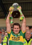 7 July 2013; Kerry captain Eoin Brosnan lifts the cup after victory over Cork. Munster GAA Football Senior Championship Final, Kerry v Cork, Fitzgerald Stadium, Killarney, Co. Kerry. Picture credit: Diarmuid Greene / SPORTSFILE