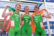 7 July 2013; Ireland's medal winners, from left, Christopher Mintern, who finished second in the men's race, Emma Sharkey, who finished third in the women's race, and Constantine Doherty, Ireland, who won the men's race, celebrate after the 2013 Waterways Ireland Athlone ETU Triathlon Junior European Cup. Athlone, Co. Westmeath. Picture credit: Pat Murphy / SPORTSFILE