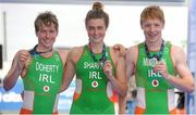 7 July 2013; Ireland's medal winners, from left, Constantine Doherty, Ireland, who won the men's race, Emma Sharkey, who finished third in the women's race, and Christopher Mintern, who finished second in the men's race, celebrate with their medals after the 2013 Waterways Ireland Athlone ETU Triathlon Junior European Cup. Athlone, Co. Westmeath. Picture credit: Pat Murphy / SPORTSFILE