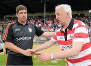 7 July 2013; Kerry manager Eamonn Fitzmaurice shakes hands with Cork manager Conor Counihan after the game. Munster GAA Football Senior Championship Final, Kerry v Cork, Fitzgerald Stadium, Killarney, Co. Kerry. Picture credit: Barry Cregg / SPORTSFILE