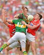 7 July 2013; Aidan Walsh and Alan O'Connor, left, Cork, in action against Kieran Donaghy and Eoin Brosnan, Kerry. Munster GAA Football Senior Championship Final, Kerry v Cork, Fitzgerald Stadium, Killarney, Co. Kerry. Picture credit: Diarmuid Greene / SPORTSFILE