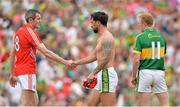 7 July 2013; Graham Canty, Cork, and Paul Galvin, Kerry, exchange a handshake after the game. Munster GAA Football Senior Championship Final, Kerry v Cork, Fitzgerald Stadium, Killarney, Co. Kerry. Picture credit: Diarmuid Greene / SPORTSFILE