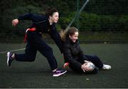 18 November 2020; Kate Hayden is tackled by Sadhbh Barr during a Leinster Rugby After School Pop Up Club at DCU in Dublin. Photo by Piaras Ó Mídheach/Sportsfile