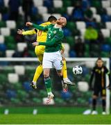 18 November 2020; Liam Boyce of Northern Ireland in action against Iulian Cristea of Romania during the UEFA Nations League B match between Northern Ireland and Romania at the National Football Stadium at Windsor Park in Belfast. Photo by David Fitzgerald/Sportsfile