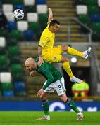 18 November 2020; Liam Boyce of Northern Ireland in action against Dan Nistor of Romania during the UEFA Nations League B match between Northern Ireland and Romania at the National Football Stadium at Windsor Park in Belfast. Photo by David Fitzgerald/Sportsfile