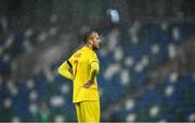 18 November 2020; Denis Alibec of Romania stands amid heavy rain during the UEFA Nations League B match between Northern Ireland and Romania at the National Football Stadium at Windsor Park in Belfast. Photo by David Fitzgerald/Sportsfile