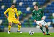 18 November 2020; Michael Smith of Northern Ireland in action against Razvan Marin of Romania during the UEFA Nations League B match between Northern Ireland and Romania at the National Football Stadium at Windsor Park in Belfast. Photo by David Fitzgerald/Sportsfile