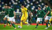 18 November 2020; Dennis Man of Romania in action against Michael Smith of Northern Ireland during the UEFA Nations League B match between Northern Ireland and Romania at the National Football Stadium at Windsor Park in Belfast. Photo by David Fitzgerald/Sportsfile