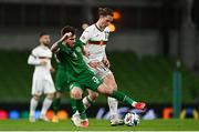 18 November 2020; Bozhidar Kraev of Bulgaria is tackled by Ryan Manning of Republic of Ireland during the UEFA Nations League B match between Republic of Ireland and Bulgaria at the Aviva Stadium in Dublin. Photo by Sam Barnes/Sportsfile