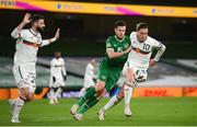 18 November 2020; Bozhidar Kraev of Bulgaria in action against Kevin Long of Republic of Ireland during the UEFA Nations League B match between Republic of Ireland and Bulgaria at the Aviva Stadium in Dublin. Photo by Stephen McCarthy/Sportsfile