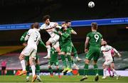 18 November 2020; Kristian Dimitrov of Bulgaria heads the ball goalwards despite the efforts of Ronan Curtis and Shane Duffy of Republic of Ireland during the UEFA Nations League B match between Republic of Ireland and Bulgaria at the Aviva Stadium in Dublin. Photo by Sam Barnes/Sportsfile