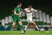18 November 2020; Denislav Aleksandrov of Bulgaria is tackled by Kevin Long of Republic of Ireland during the UEFA Nations League B match between Republic of Ireland and Bulgaria at the Aviva Stadium in Dublin. Photo by Sam Barnes/Sportsfile