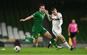 18 November 2020; Denislav Aleksandrov of Bulgaria is tackled by Kevin Long of Republic of Ireland during the UEFA Nations League B match between Republic of Ireland and Bulgaria at the Aviva Stadium in Dublin. Photo by Sam Barnes/Sportsfile