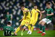 18 November 2020; Florin Tanase of Romania in action against Alistair McCann of Northern Ireland, right, and Stuart Dallas during the UEFA Nations League B match between Northern Ireland and Romania in the National Football Stadium at Windsor Park in Belfast. Photo by David Fitzgerald/Sportsfile