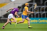 14 November 2020; Jason McCarthy of Clare in action against Joe O'Connor of Wexford during the GAA Hurling All-Ireland Senior Championship Qualifier Round 2 match between Wexford and Clare at MW Hire O'Moore Park in Portlaoise, Laois. Photo by Piaras Ó Mídheach/Sportsfile