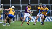 14 November 2020; Diarmuid O'Keeffe of Wexford in action against Aidan McCarthy, left, and Shane O'Donnell of Clare during the GAA Hurling All-Ireland Senior Championship Qualifier Round 2 match between Wexford and Clare at MW Hire O'Moore Park in Portlaoise, Laois. Photo by Piaras Ó Mídheach/Sportsfile