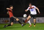 20 November 2020; David McMillan of Dundalk in action against Keith Buckley of Bohemians during the Extra.ie FAI Cup Quarter-Final match between Bohemians and Dundalk at Dalymount Park in Dublin. Photo by Stephen McCarthy/Sportsfile