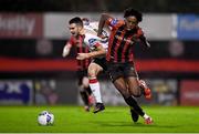 20 November 2020; Promise Omochere of Bohemians pulls the shirt of Michael Duffy of Dundalk during the Extra.ie FAI Cup Quarter-Final match between Bohemians and Dundalk at Dalymount Park in Dublin. Photo by Ben McShane/Sportsfile